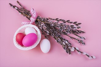 Colorful easter eggs with willow branches