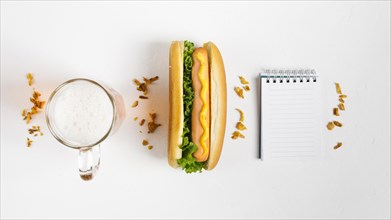 Flat lay hotdog with notepad mock up