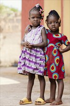 Full shot cute african girls posing outdoors