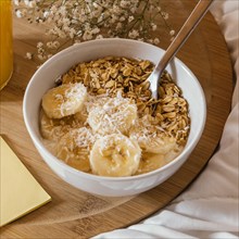 High angle bowl with cereal banana