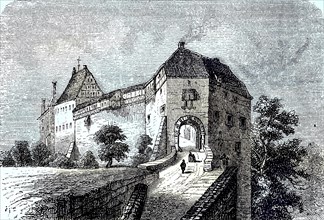 Das Tor der Wartburg ueber der Stadt Eisenach in Thueringen