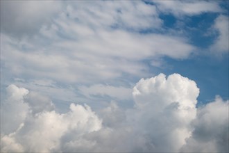 Dark and grey clouds are in the sky