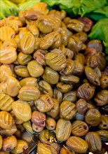 Turkish style prepared olives in the market stands