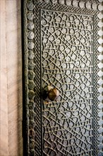 Ottoman styled geometric patterns on metal doors