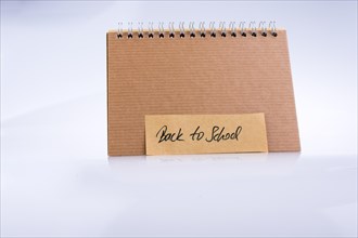 Notebook and back to school title on a notebook