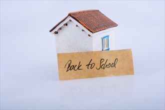 The title back to school and a model house