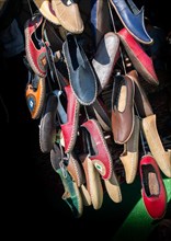 Set of traditional hand made leather shoes in a bazaar
