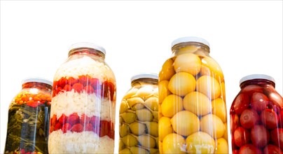 Jars preserved vegetables. Canned food in glass jars. Grocery conserve containers