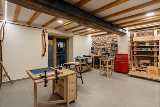 Interior space of a screen printing studio with different tables to work