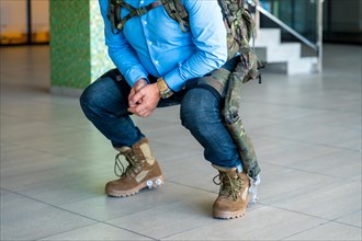 Mechanical military exoskeleton to help unrecognizable soldiers and military personnel in their work