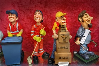 Funny ceramic figurines with different professions