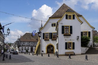 Historic town hall built 1532 with town flag
