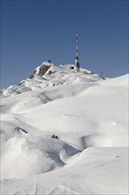 Dobratsch summit with transmission mast