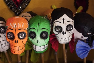 Skull dolls in shop windows