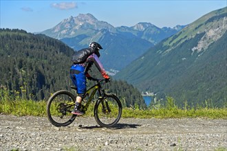 Mountain bikers on an alpine descent in the Chablais Geopark