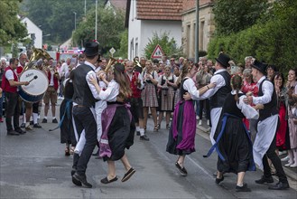 Music and dancing on the village street at the traditional Lindentanzfest in Limmersdorf