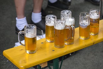 Beers for the musicians on a beer bench