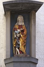 Figure of a saint with child