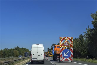 Single lane narrowing due to roadworks vehicle on the A6 motorway
