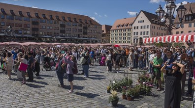 Tourists have been watching the so-called Maennleinlaufen of the art clock since 1509