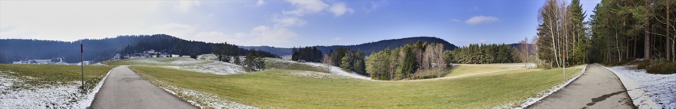 240 degree panorama of a landscape in the Black Forest with remnants of snow near Lauterbach