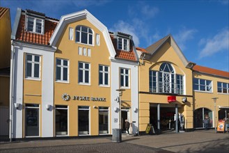 Danish bank in the city centre and typical yellow houses