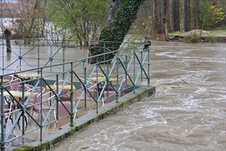 Flooded brook and terrace of restaurant at Nederzwalm