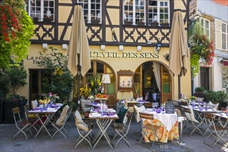 Laid tables outside in front of restaurant in the city Strasbourg