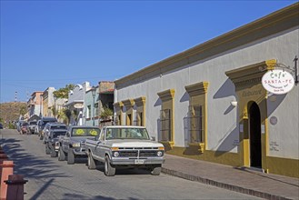 Street with restaurants and bars in the coastal village Todos Santos on the peninsula of Baja California Sur
