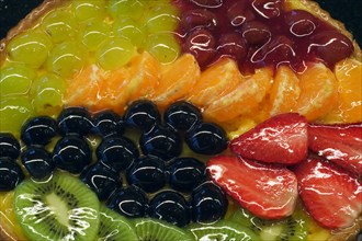 Colourful fruit tart in pastry shop