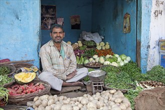 Shopkeeper selling vegetables in Agra