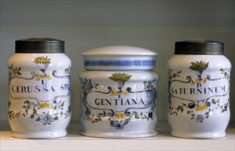 Old pharmacy Delftware pots with herbs as medicines in Latin on display