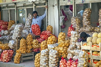 Greengrocer selling potatoes and onions on the street in the city Van
