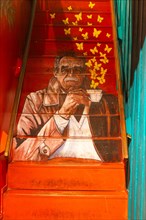 Staircase with graffiti portrait