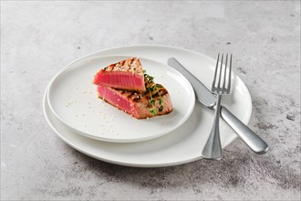 Grilled ahi tuna steak on a plate