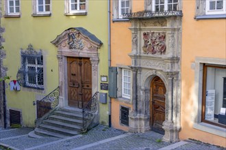 Green Stellwaghaus with staircase and orange Renaissance Widmannhaus