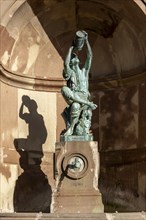 Detail of the fountain from the bronze statue of The Little Winegrower