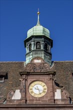 Roof of the New Town Hall with clock and small tower in the background