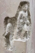 Detail with a carved stone figure on a stone column from the monument Jewish Life in Rottenburg by the artist Ralf Ehmann Eskefen