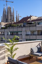 View of the Sagrada Familia and neighborhood buildings in Barcelona Spain