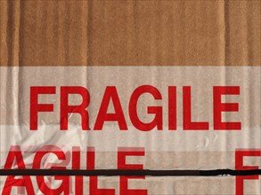 Fragile on cardboard packet