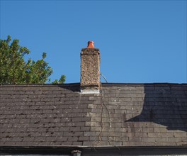Traditional british roof with chimney