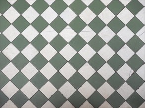 Green and white tiled floor