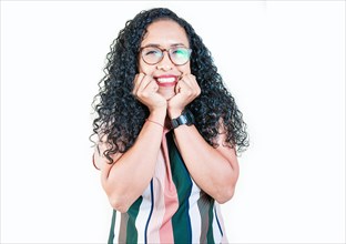 Cheerful and friendly afro young woman looking and smiling at the camera. Portrait of friendly afro girl in glasses smiling isolated. Young Nicaraguan woman smiling at camera