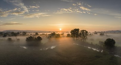 Aerial panorama of the Radolfzeller Aach in the Radolfzeller Aachried at sunrise and ground fog