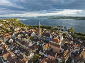 Aerial view of the town of Radolfzell on Lake Constance with the Radolfzell Minster in front of sunset