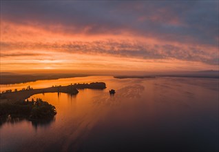 Aerial panorama of western Lake Constance in front of sunrise with the Mettnau peninsula