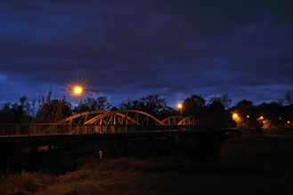 Woerlitz railway bridge near Dessau-Rosslau over the River Mulde at night