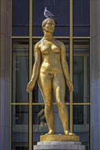 Golden male statue by Felix Alexandre Desruelles