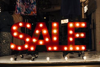 Glowing signboard sale store